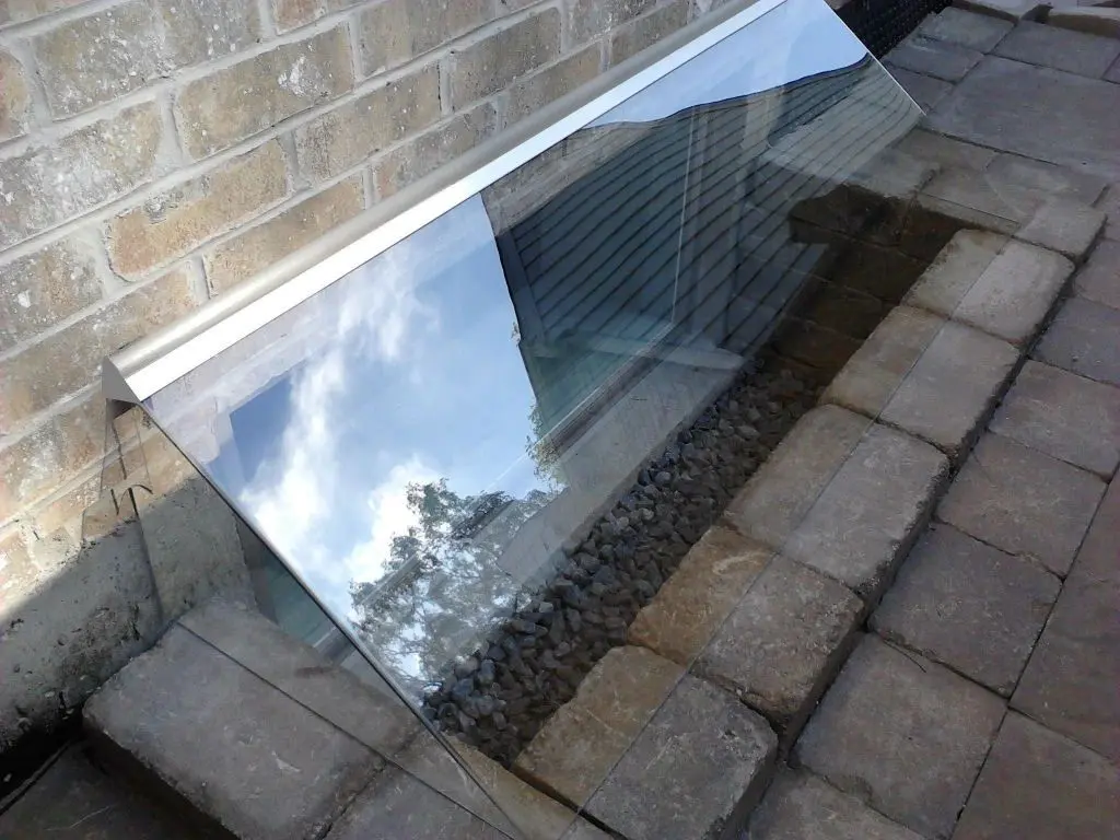 A reflective basement window cover